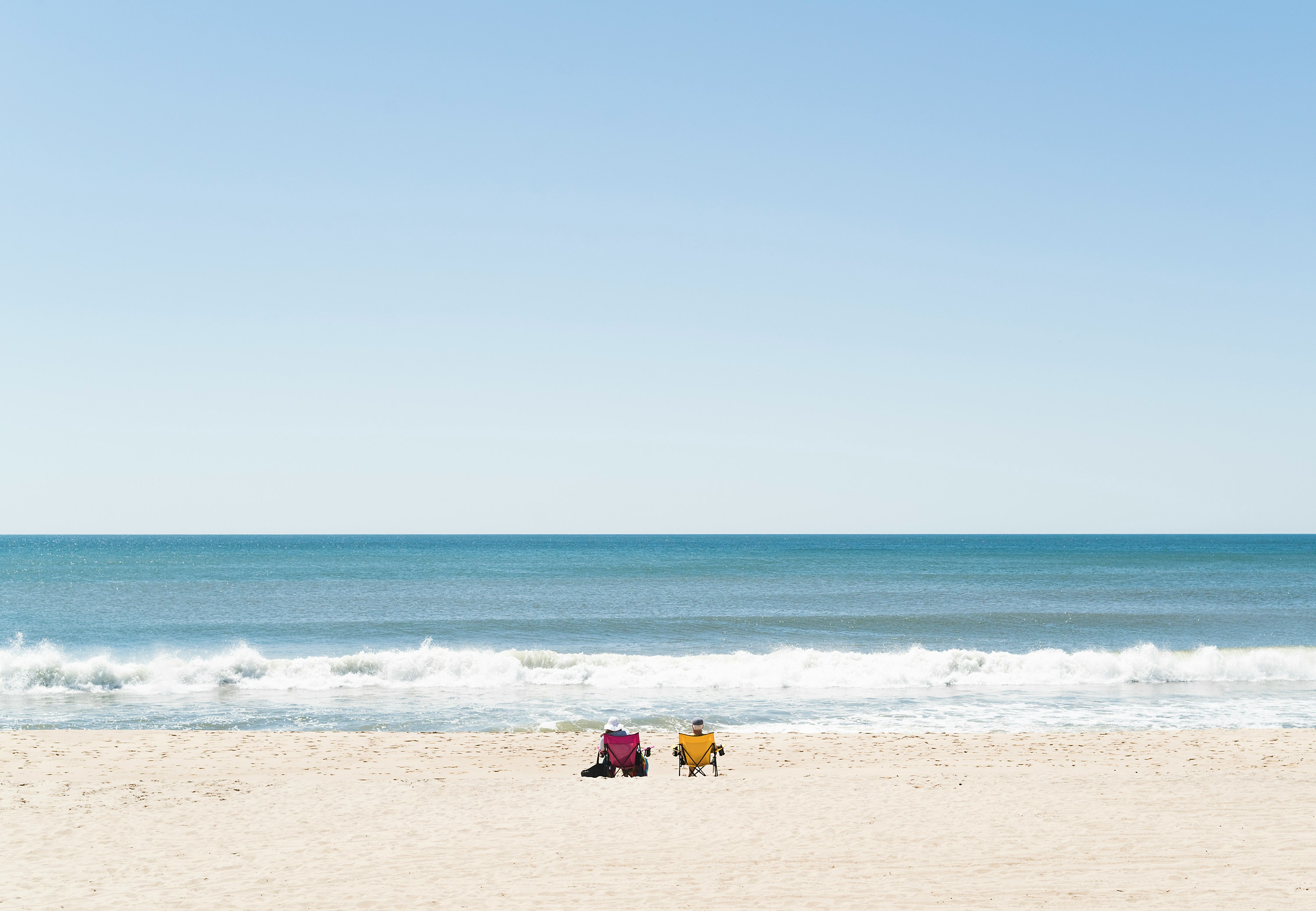 people in beach chairs
